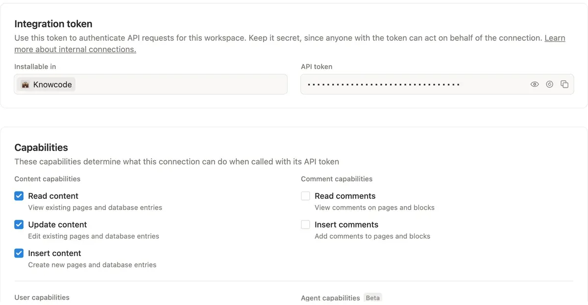 The Configuration tab of a Notion connection: Integration token with the hidden API token and its show and copy icons, and Capabilities with Read, Update and Insert content ticked
